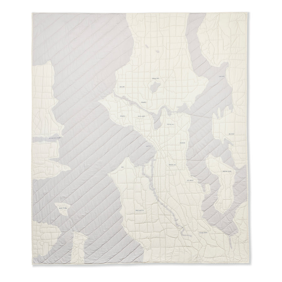 Ivory and warm grey map quilt of the city of Seattle. Haptic Lab 