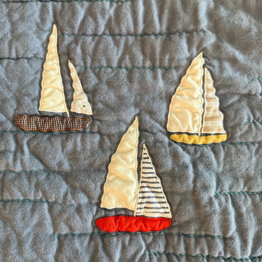 Appliqued sailboats using deadstock fabrics 