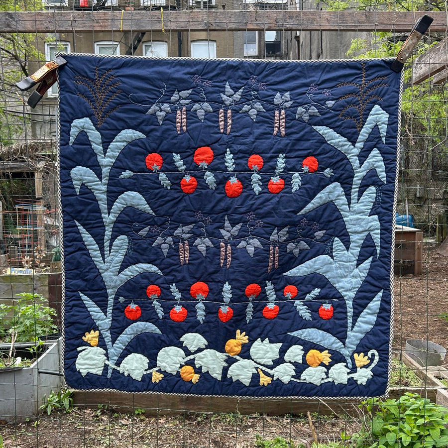 Garden Quilt hanging in the garden by Haptic Lab