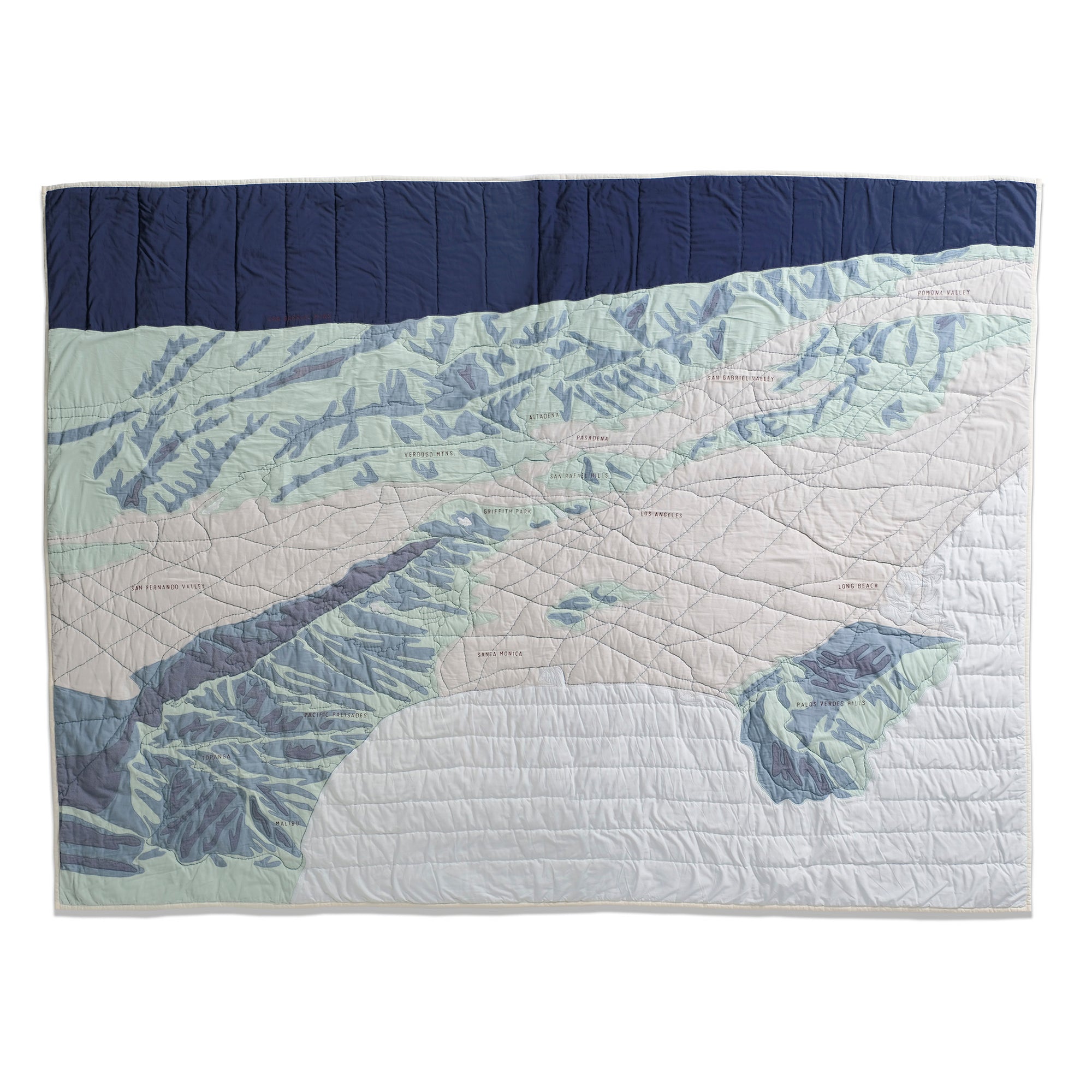 A quilted map of the Los Angeles Mountains on a white background
