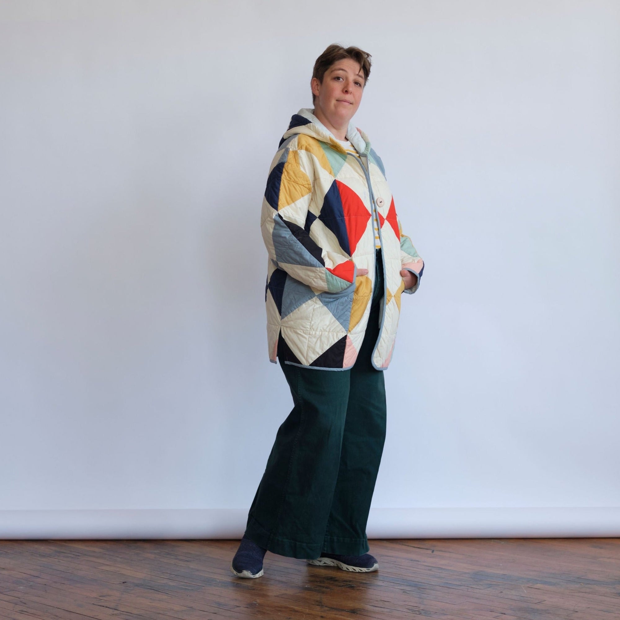 Harlequin Quilt Coat_ ivory coat with multicolored diamond patchwork. Quilt Coat by Haptic Lab