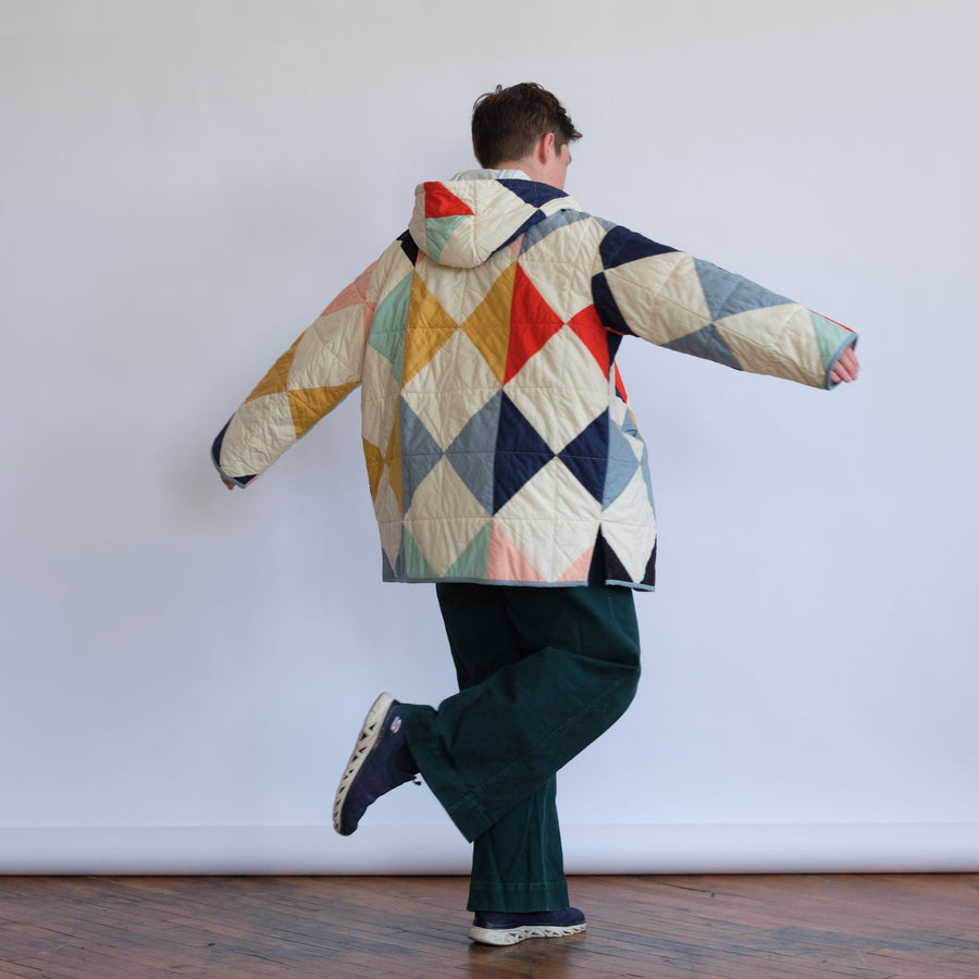 Harlequin Quilt Coat_ ivory coat with multicolored diamond patchwork. Quilt Coat by Haptic Lab