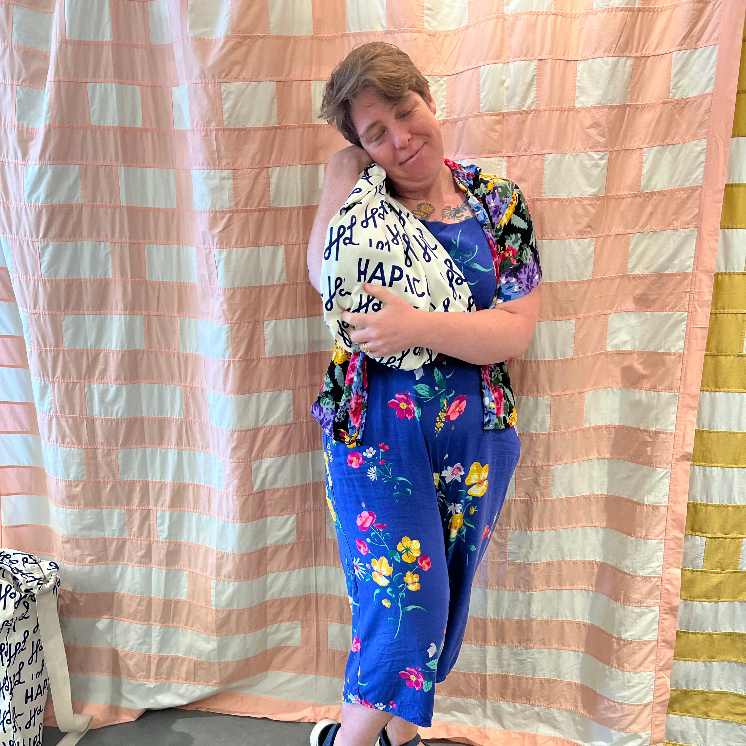 Barbara clutching the small gift bag