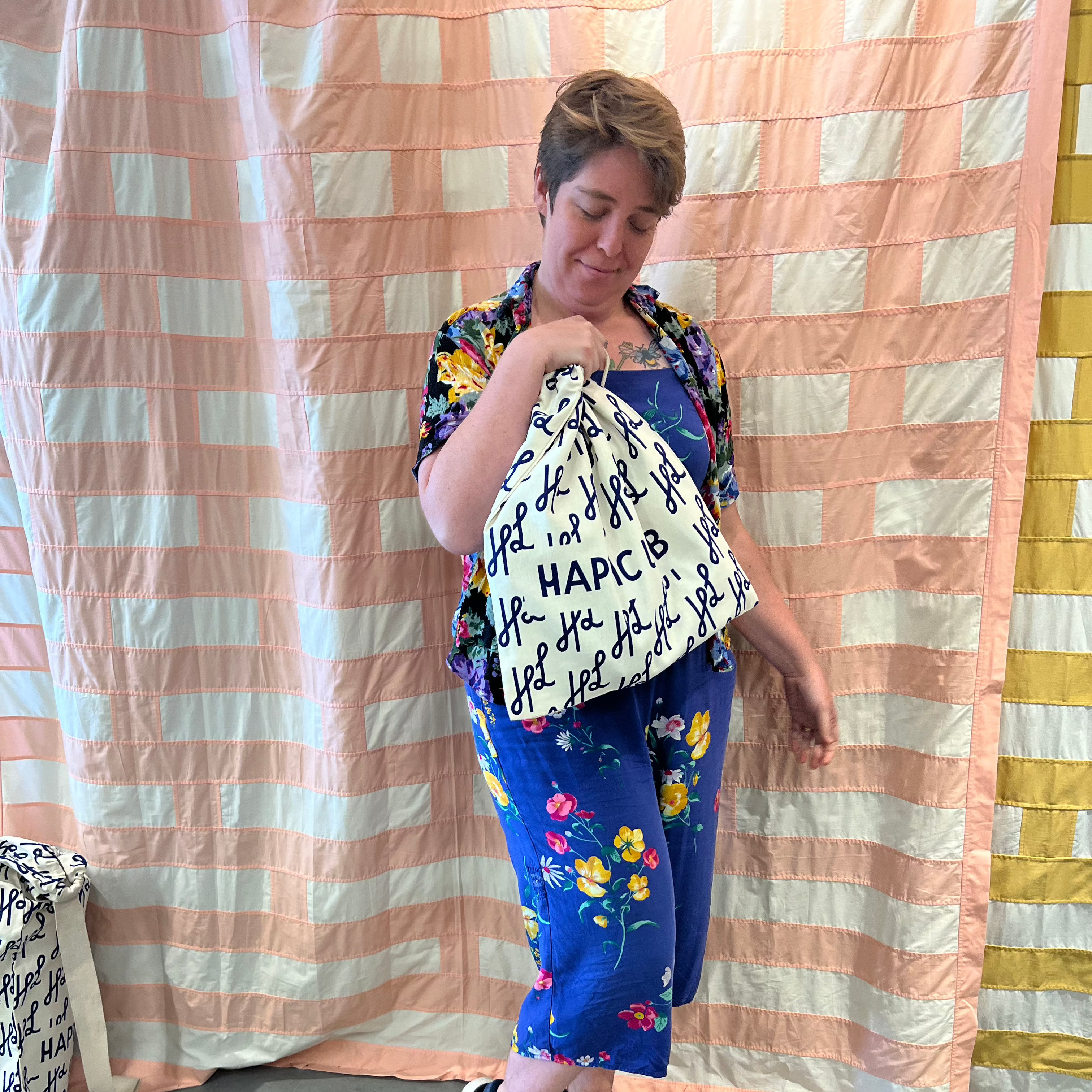 Barbara modeling the small Haptic Lab gift bag