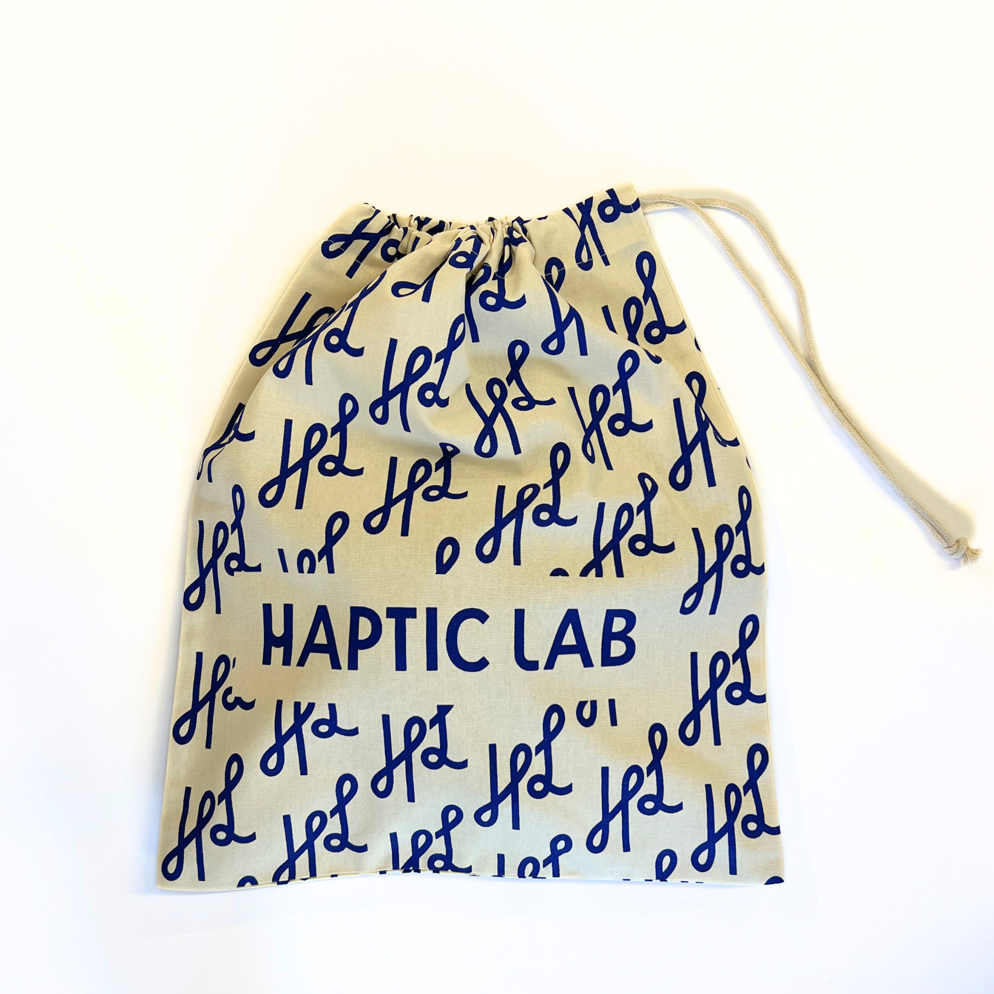 Small Haptic Lab gift bag with repeating Haptic Lab logo