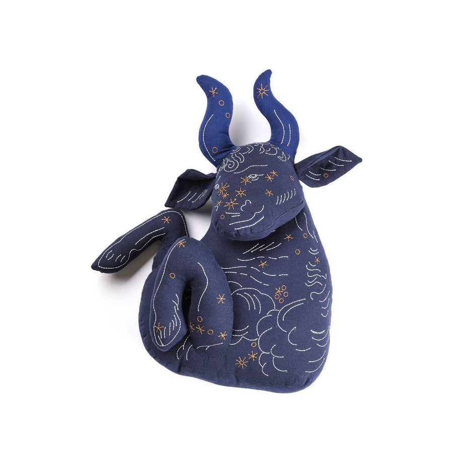 Handmade stuffed animal of zodiac sign Taurus by Haptic Lab, handmade and embroidered with silk details.