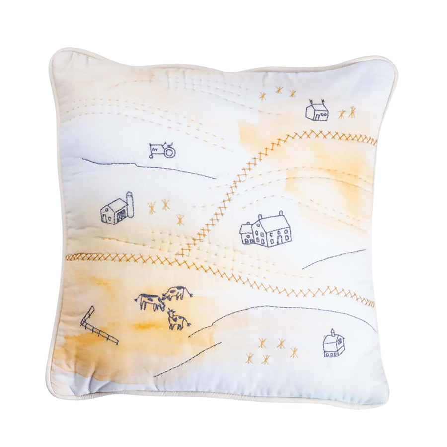 Haptic Lab embroidered pillow with farmstead and cows