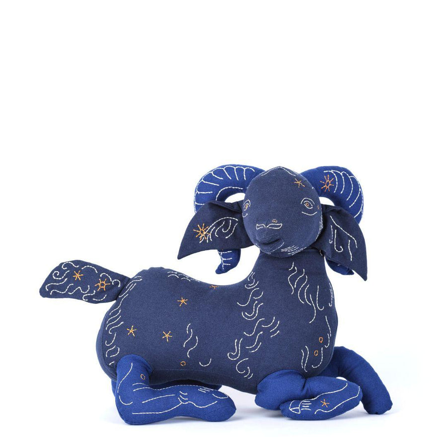 Handmade stuffed animal of zodiac sign Aries by Haptic Lab, handmade and embroidered with silk details.