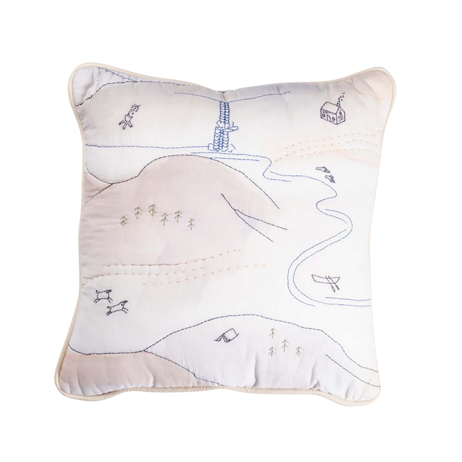 Haptic Lab embroidered pillow with mountain stream and waterfall