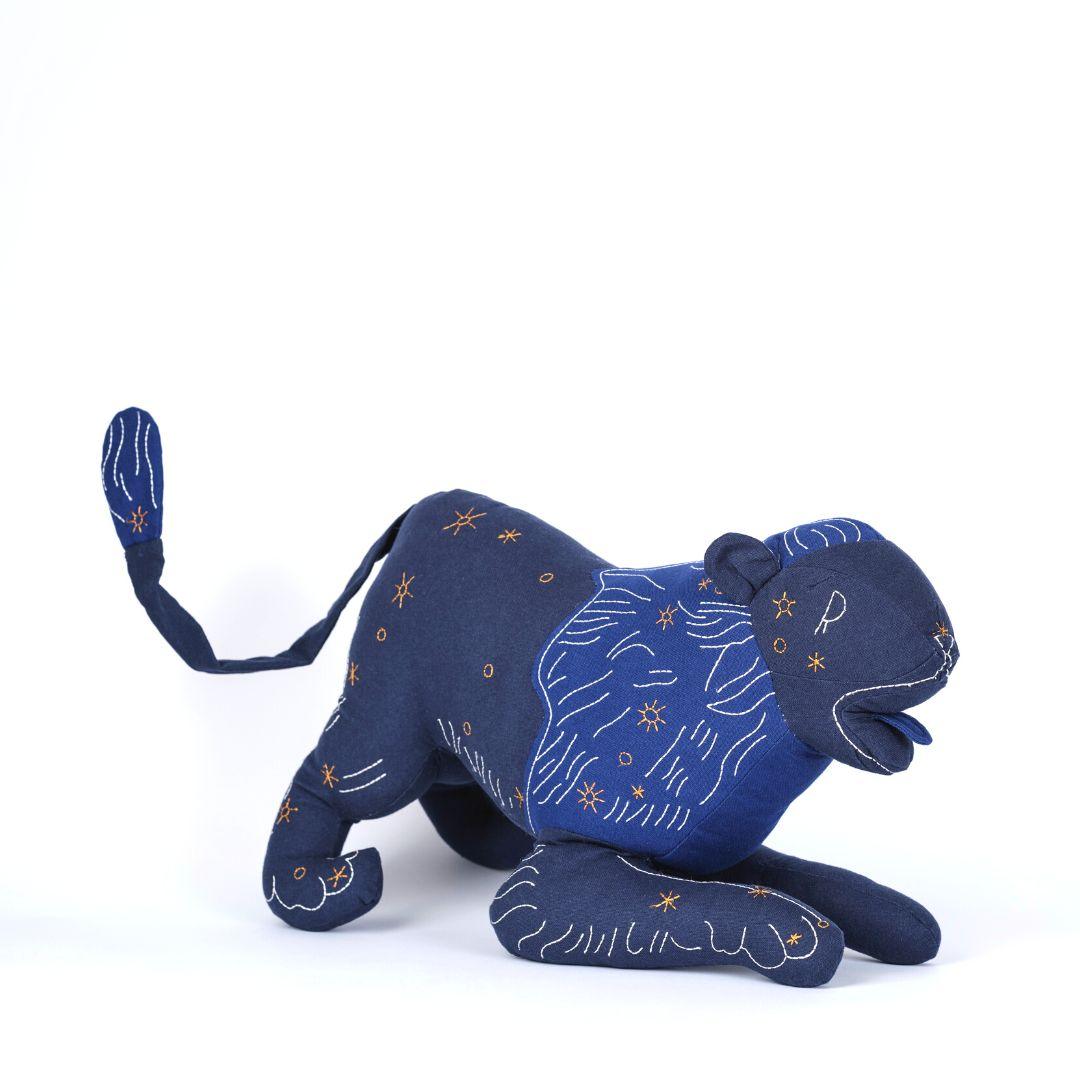 Handmade stuffed animal of zodiac sign Leo by Haptic Lab, handmade and embroidered with silk details.