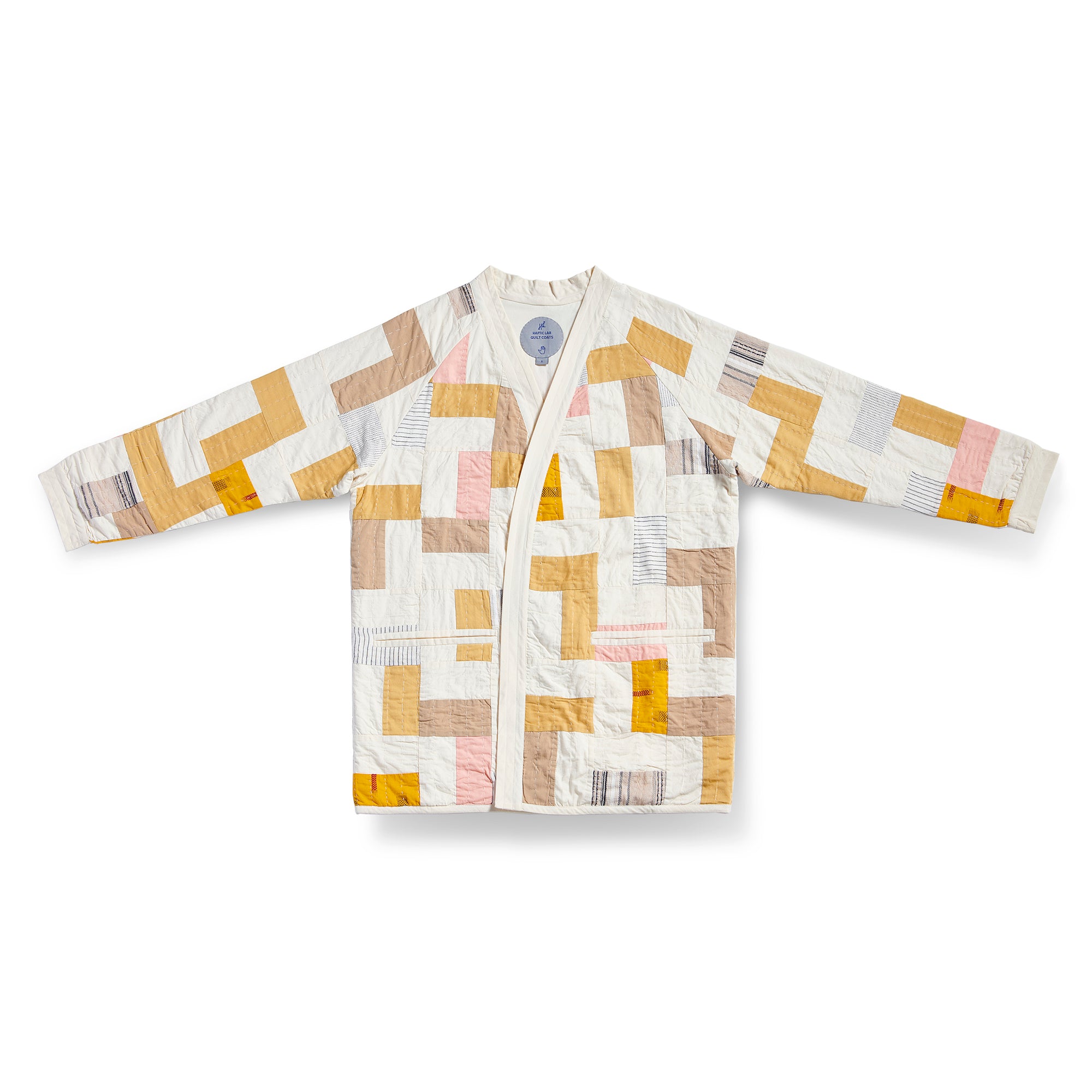 Kantha weight spring quilt coat with an inverted stair pattern. Jacket is ivory with shade of light yellow and pink piecework. 