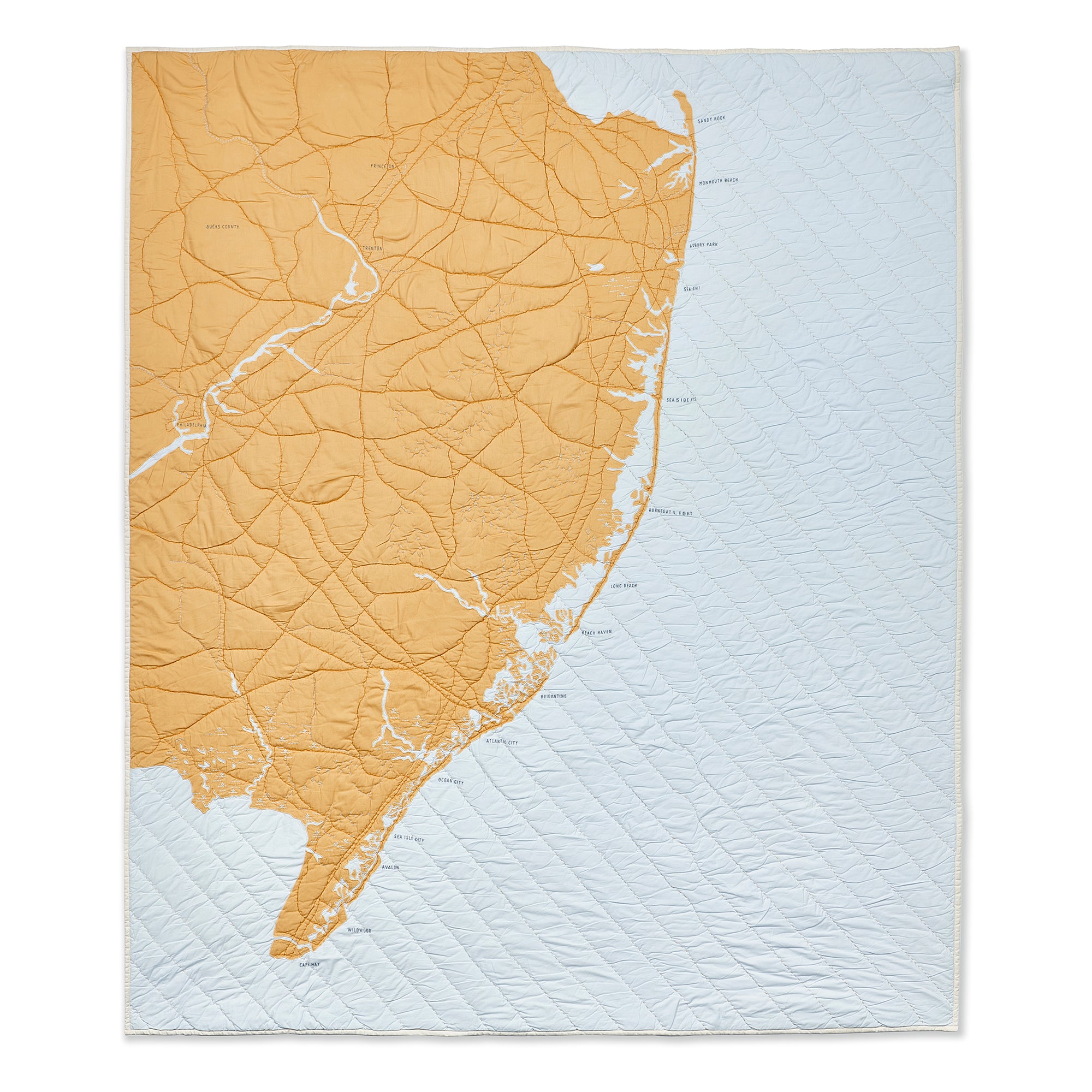 Map quilt of Jersey Shore in Pale Blue and gold.