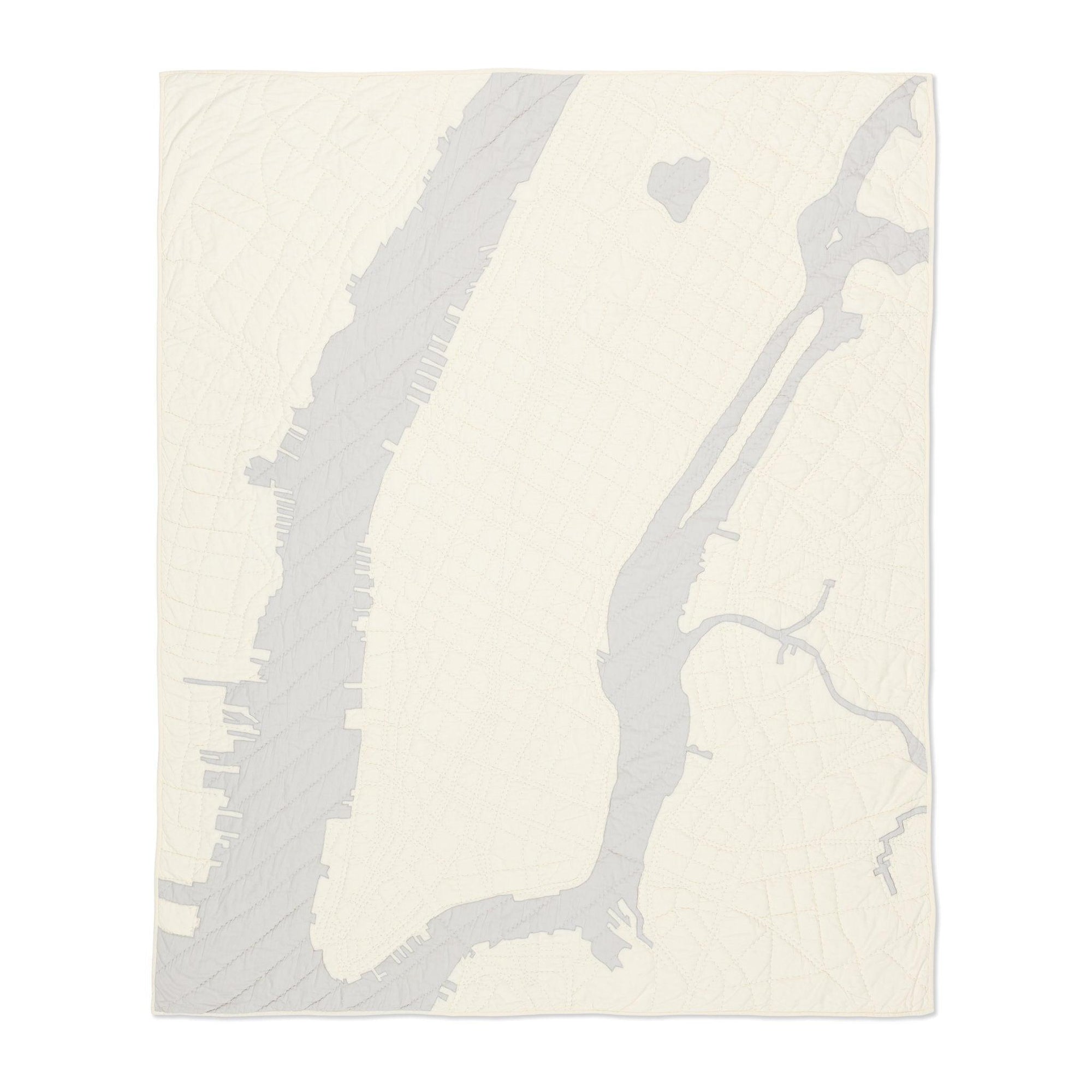 Heirloom quilt, a hand-stitched map of New York City with ivory land and gray water.