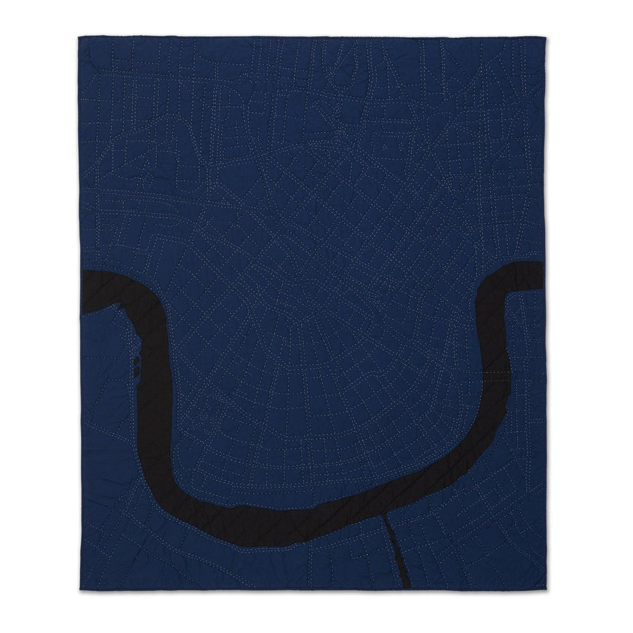 Heirloom quilt, a hand-stitched map of New Orleans with dark blue land and black water.