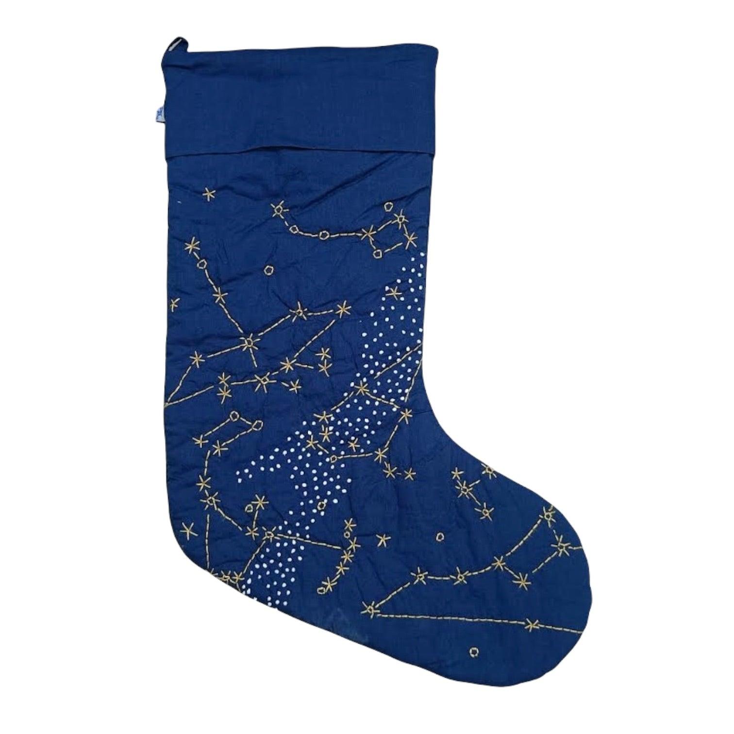 Navy Constellation Stocking with hand quilted gold constellations and a milky way made out of french knots. 